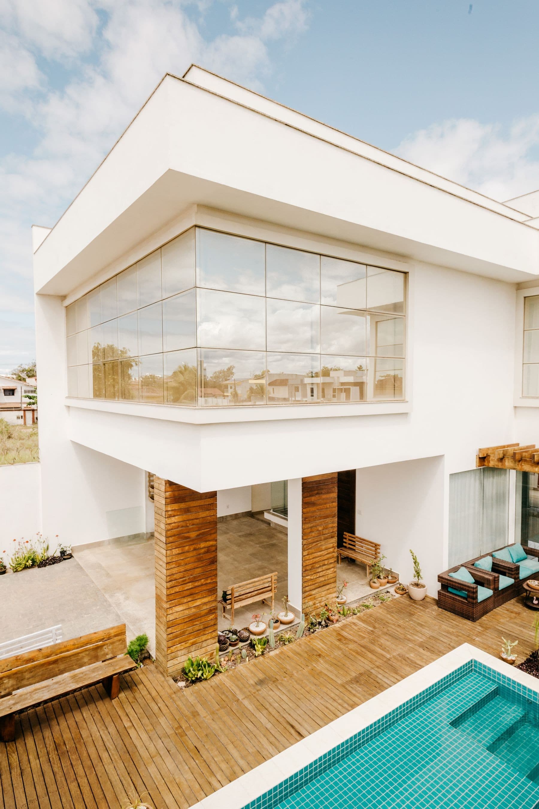 Contemporary home and pool photographed at sunset